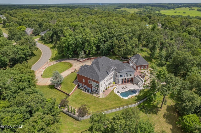 1126 Carrington Ter, Joplin, MO 64804 - drone / aerial view of a forest and a pool area