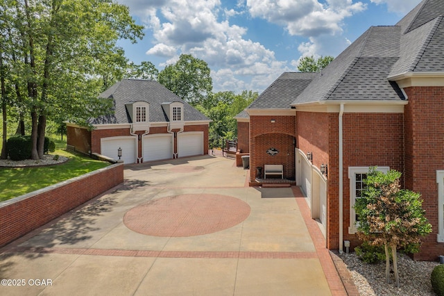 1126 Carrington Ter, Joplin, MO 64804 - view of patio / terrace with concrete driveway