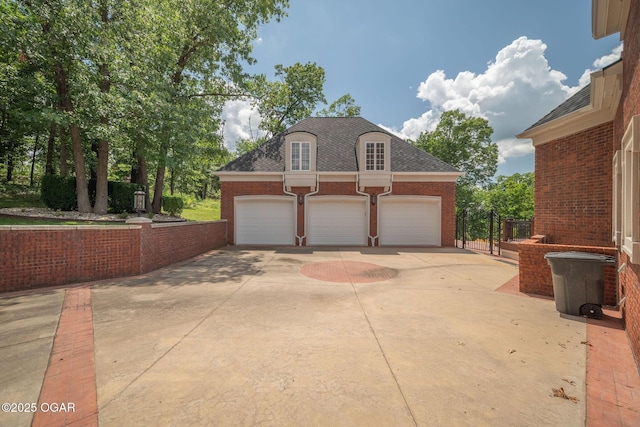 1126 Carrington Ter, Joplin, MO 64804 - garage with concrete driveway