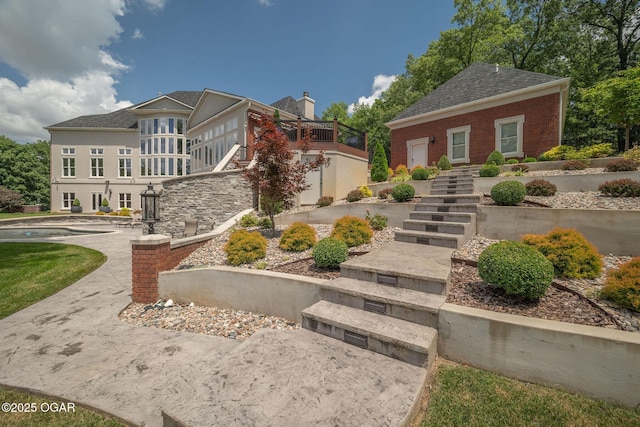 1126 Carrington Ter, Joplin, MO 64804 - view of front of home featuring stairway and a shingled roof