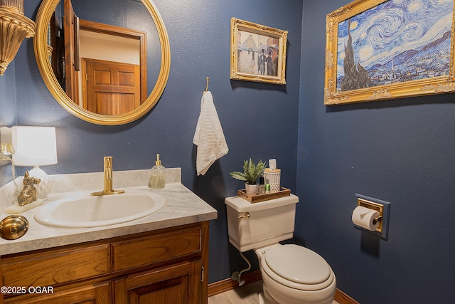 2005 Laura Ln, Joplin, MO 64801 - bathroom featuring vanity and wood finished floors