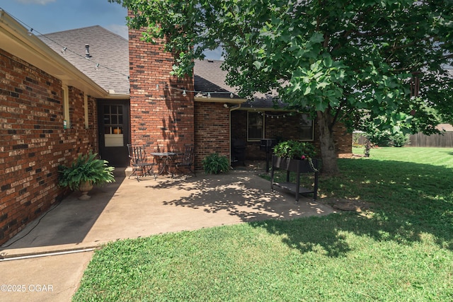 2005 Laura Ln, Joplin, MO 64801 - view of green lawn featuring a patio area