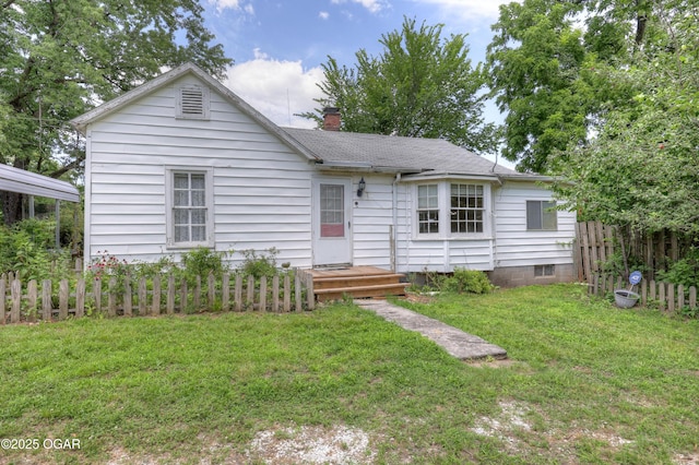 1123 Garden Grove Rd, Joplin, MO 64801 - view of front of house featuring a chimney and a shingled roof