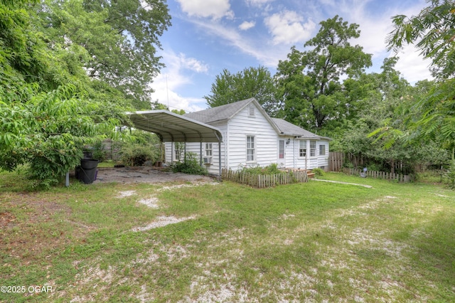 1123 Garden Grove Rd, Joplin, MO 64801 - view of yard featuring a carport and driveway