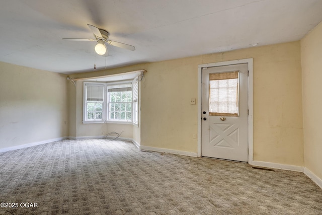 1123 Garden Grove Rd, Joplin, MO 64801 - carpeted foyer featuring ceiling fan and baseboards
