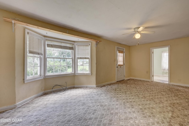 1123 Garden Grove Rd, Joplin, MO 64801 - carpeted spare room featuring a ceiling fan and baseboards