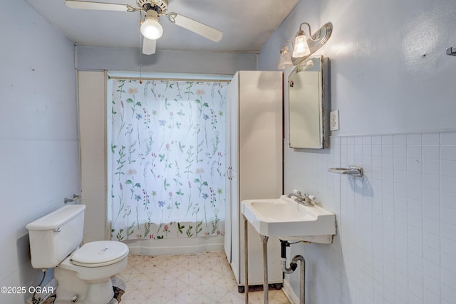 1123 Garden Grove Rd, Joplin, MO 64801 - full bathroom with tile patterned floors, a ceiling fan, and a shower with shower curtain