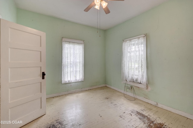 1123 Garden Grove Rd, Joplin, MO 64801 - spare room with plenty of natural light, ceiling fan, and hardwood / wood-style flooring