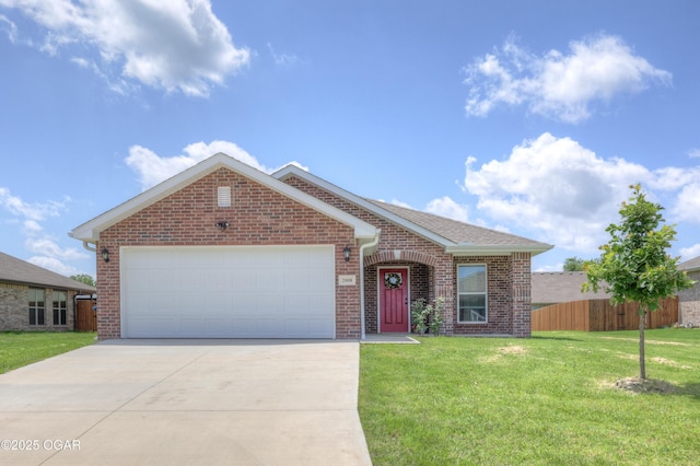 2008 Greydon Ln, Webb City, MO 64870 - view of front of home featuring driveway, brick siding, and an attached garage