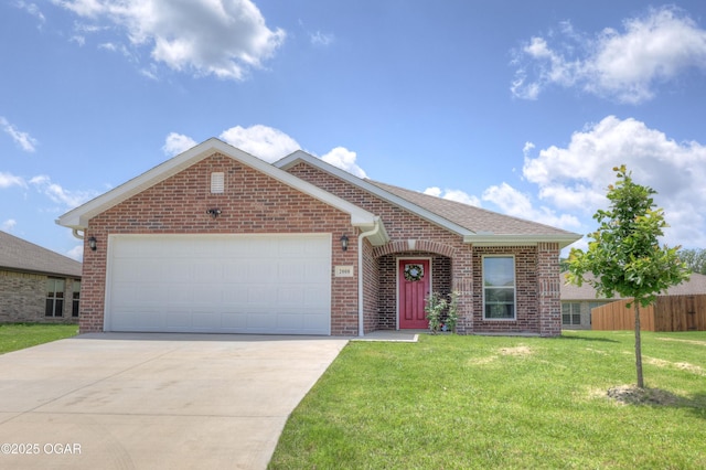2008 Greydon Ln, Webb City, MO 64870 - view of front of house featuring brick siding, driveway, an attached garage, and roof with shingles