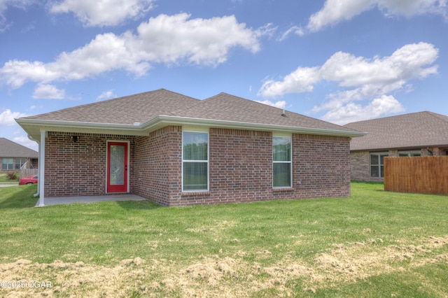 2008 Greydon Ln, Webb City, MO 64870 - back of house with brick siding and a shingled roof