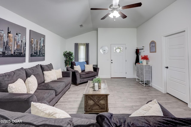 2008 Greydon Ln, Webb City, MO 64870 - living room featuring lofted ceiling, a ceiling fan, and light wood-style floors