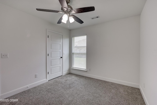 2008 Greydon Ln, Webb City, MO 64870 - empty room featuring carpet flooring and a ceiling fan