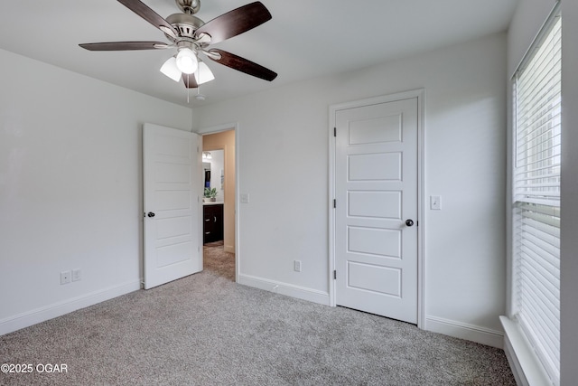 2008 Greydon Ln, Webb City, MO 64870 - unfurnished bedroom featuring carpet and a ceiling fan