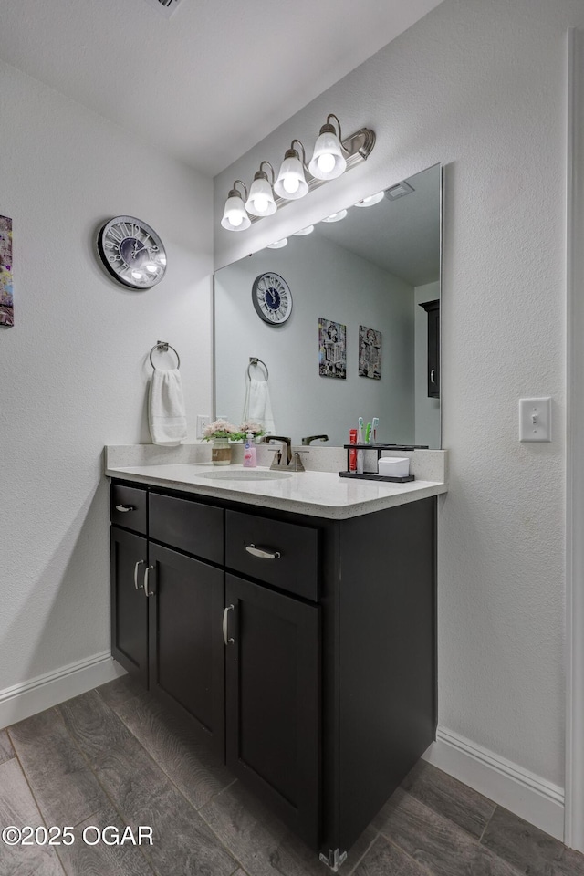 2008 Greydon Ln, Webb City, MO 64870 - bathroom with vanity and baseboards