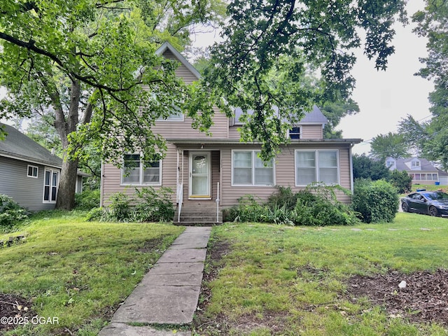 303 E Centennial Ave, Carthage, MO 64836 - view of front of property with a front yard