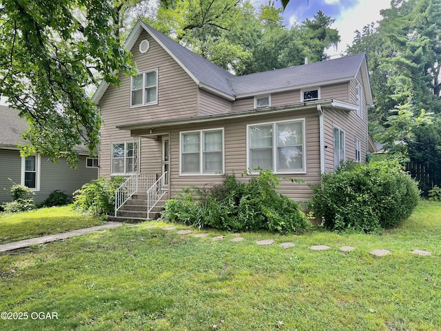 303 E Centennial Ave, Carthage, MO 64836 - view of front facade featuring a front yard