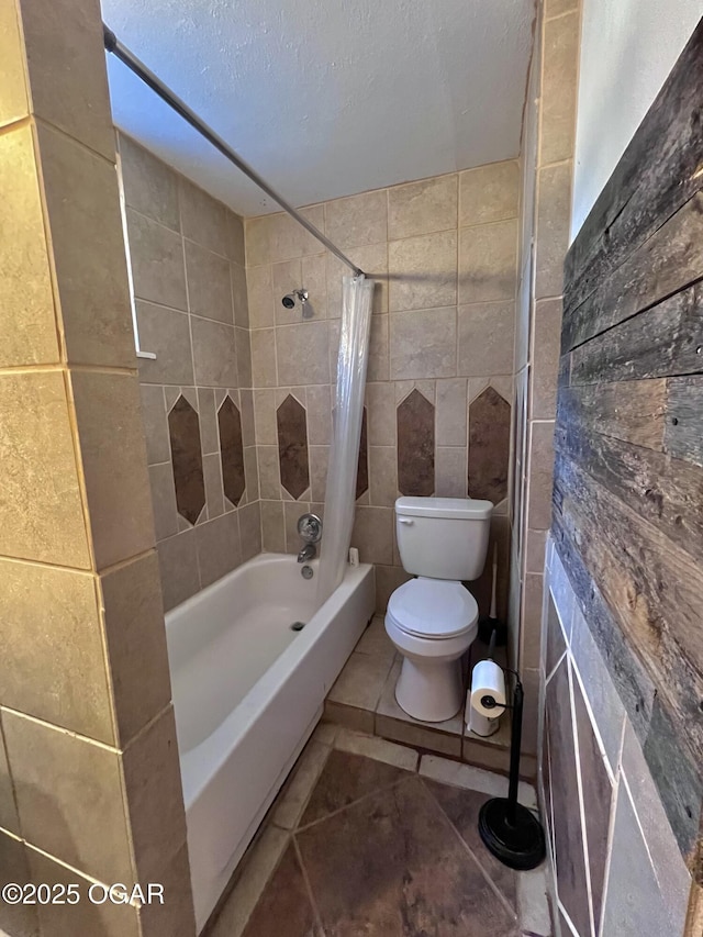 303 E Centennial Ave, Carthage, MO 64836 - full bathroom with shower / bath combo, tile patterned flooring, and tile walls
