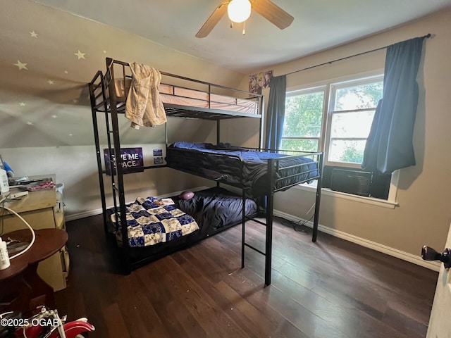 303 E Centennial Ave, Carthage, MO 64836 - bedroom featuring wood finished floors and baseboards