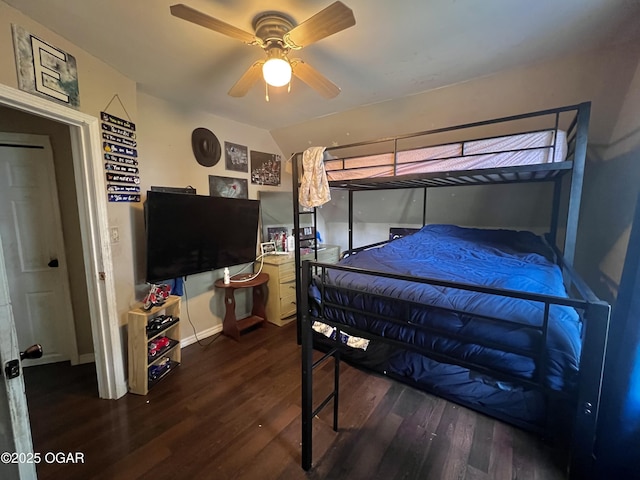 303 E Centennial Ave, Carthage, MO 64836 - bedroom with wood finished floors, vaulted ceiling, and a ceiling fan