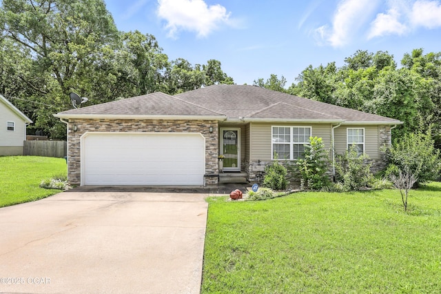 302 E 44th St, Joplin, MO 64804 - view of front of house with driveway, an attached garage, stone siding, and roof with shingles