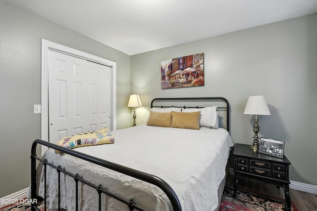 302 E 44th St, Joplin, MO 64804 - bedroom featuring wood finished floors and a closet