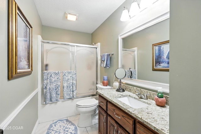 302 E 44th St, Joplin, MO 64804 - bathroom featuring vanity, tile patterned floors, and enclosed tub / shower combo