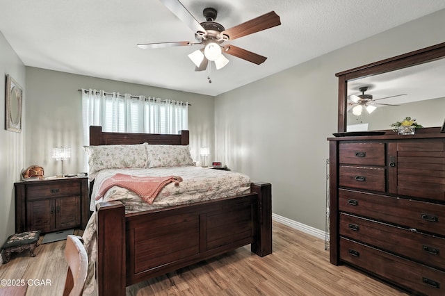 302 E 44th St, Joplin, MO 64804 - bedroom featuring light wood-style floors and ceiling fan