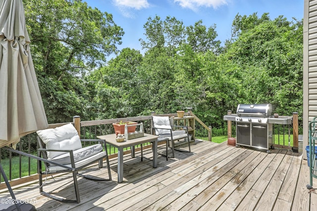 302 E 44th St, Joplin, MO 64804 - wooden terrace with grilling area and outdoor lounge area