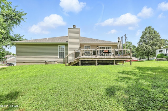 302 E 44th St, Joplin, MO 64804 - rear view of house featuring a wooden deck, a lawn, and a chimney