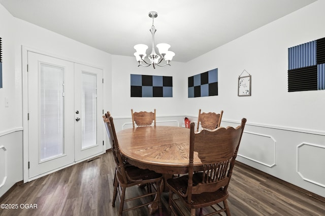1901 Laura Ln, Joplin, MO 64801 - dining space featuring french doors, a chandelier, and wood finished floors