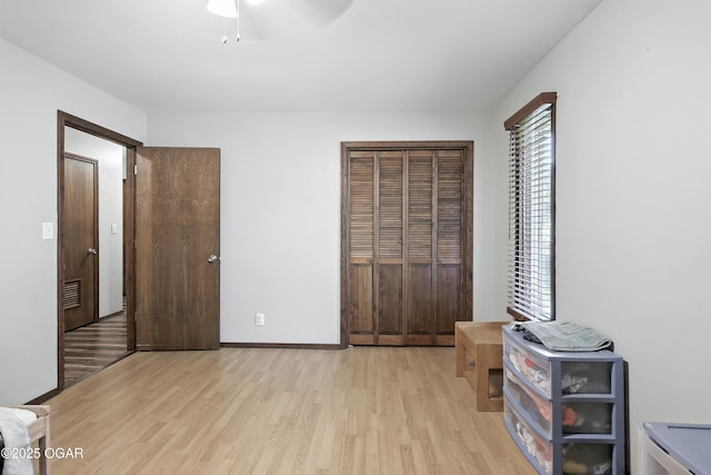 1901 Laura Ln, Joplin, MO 64801 - unfurnished bedroom featuring light wood-style floors and a ceiling fan