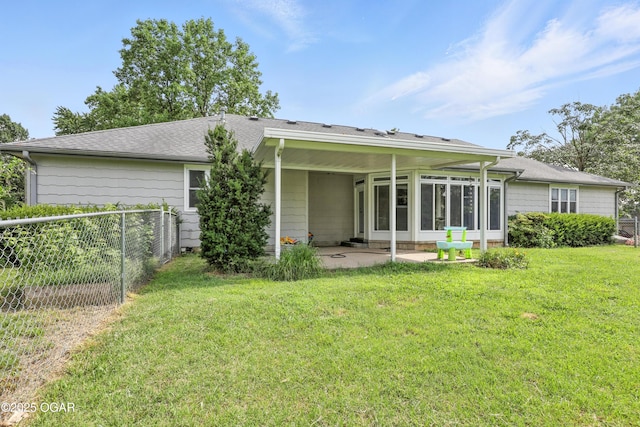 1901 Laura Ln, Joplin, MO 64801 - back of house featuring a patio and a sunroom