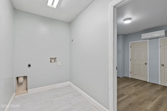 119 Jared Blvd, Webb City, MO 64870 - laundry room with a wall mounted AC, washer hookup, electric dryer hookup, and light marble finish flooring