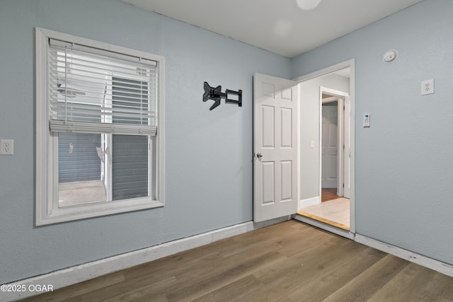 119 Jared Blvd, Webb City, MO 64870 - spare room with wood finished floors and a smoke detector