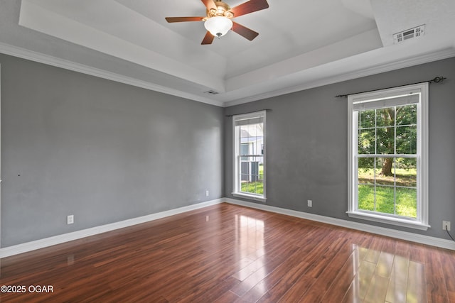 119 Jared Blvd, Webb City, MO 64870 - unfurnished room with a raised ceiling, wood finished floors, a ceiling fan, and crown molding