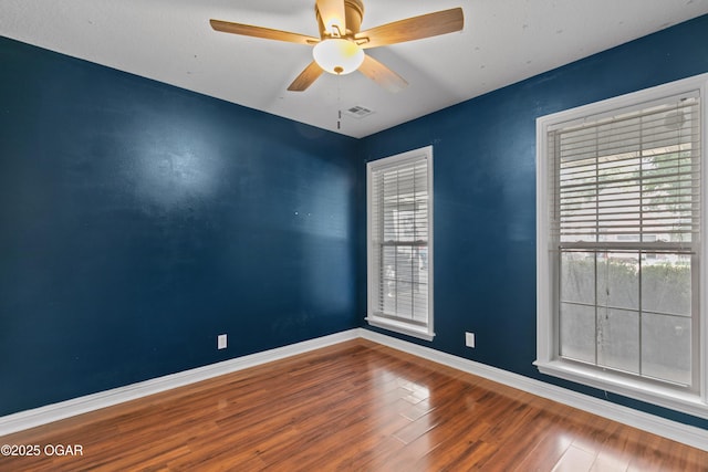 119 Jared Blvd, Webb City, MO 64870 - unfurnished room with wood finished floors and ceiling fan