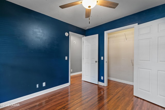 119 Jared Blvd, Webb City, MO 64870 - unfurnished bedroom featuring wood finished floors, a closet, and a ceiling fan