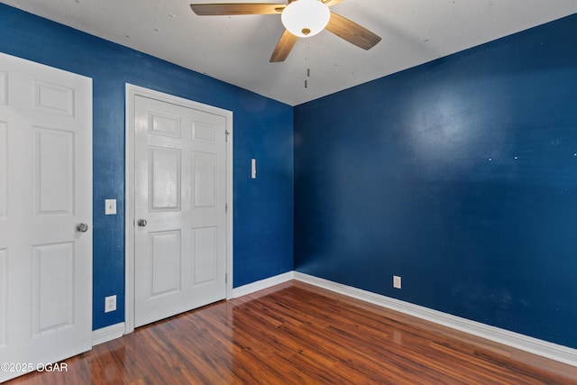 119 Jared Blvd, Webb City, MO 64870 - unfurnished bedroom featuring wood finished floors and a ceiling fan