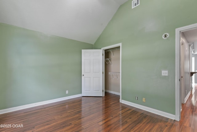 119 Jared Blvd, Webb City, MO 64870 - unfurnished bedroom with wood finished floors, a closet, a spacious closet, and high vaulted ceiling