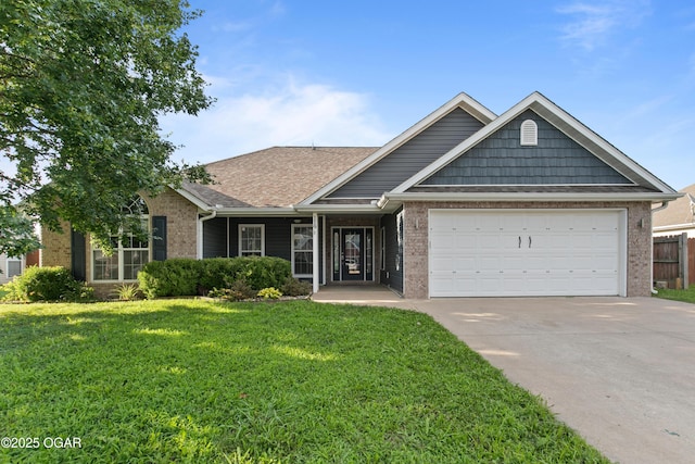 119 Jared Blvd, Webb City, MO 64870 - view of front facade featuring brick siding, an attached garage, concrete driveway, and roof with shingles