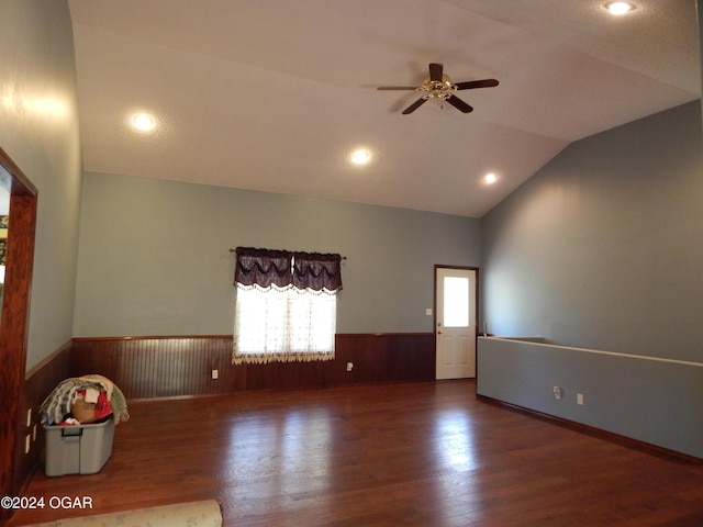 3065 Coyote Dr, Joplin, MO 64804 - spare room featuring wainscoting, wood finished floors, ceiling fan, lofted ceiling, and recessed lighting