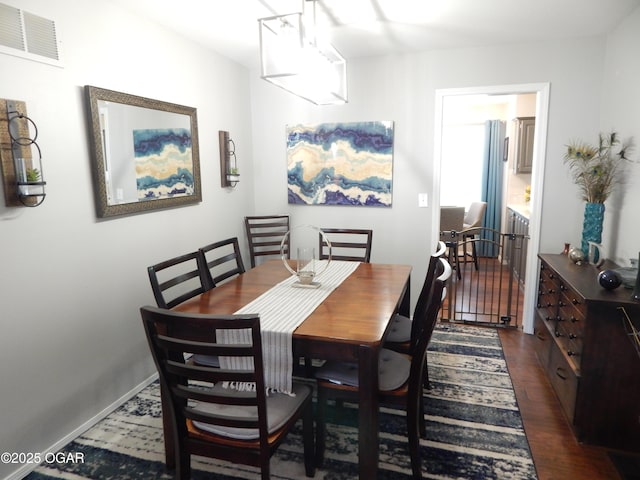 2722 E Wickersham Rd, Joplin, MO 64804 - dining space featuring dark wood-style flooring