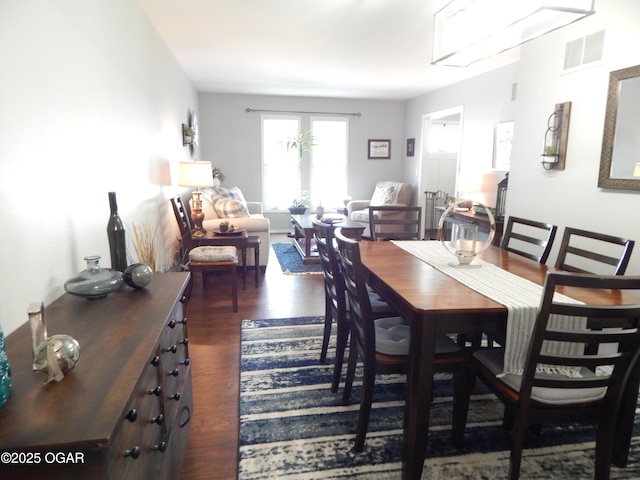 2722 E Wickersham Rd, Joplin, MO 64804 - dining room featuring dark wood-style floors