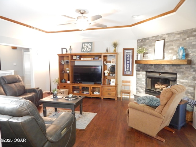 2722 E Wickersham Rd, Joplin, MO 64804 - living room featuring ceiling fan, ornamental molding, a fireplace, dark wood finished floors, and a raised ceiling