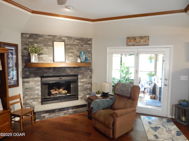 2722 E Wickersham Rd, Joplin, MO 64804 - living room with crown molding, wood finished floors, and a fireplace