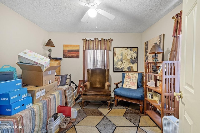417 S Mcgregor St, Carthage, MO 64836 - living area with a textured ceiling and a ceiling fan