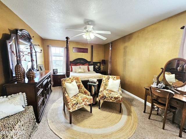 2813 Heartland Ave, Joplin, MO 64804 - bedroom with light carpet, a textured ceiling, and a ceiling fan