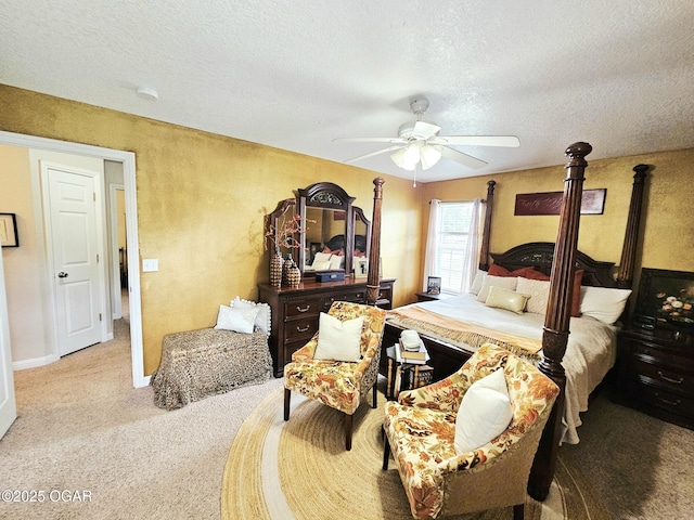 2813 Heartland Ave, Joplin, MO 64804 - carpeted bedroom with a textured ceiling and ceiling fan
