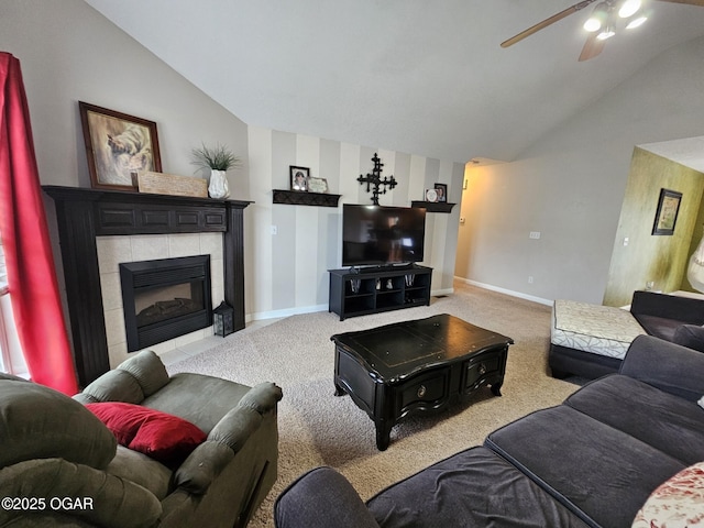 2813 Heartland Ave, Joplin, MO 64804 - living room with vaulted ceiling, ceiling fan, carpet, and a tile fireplace